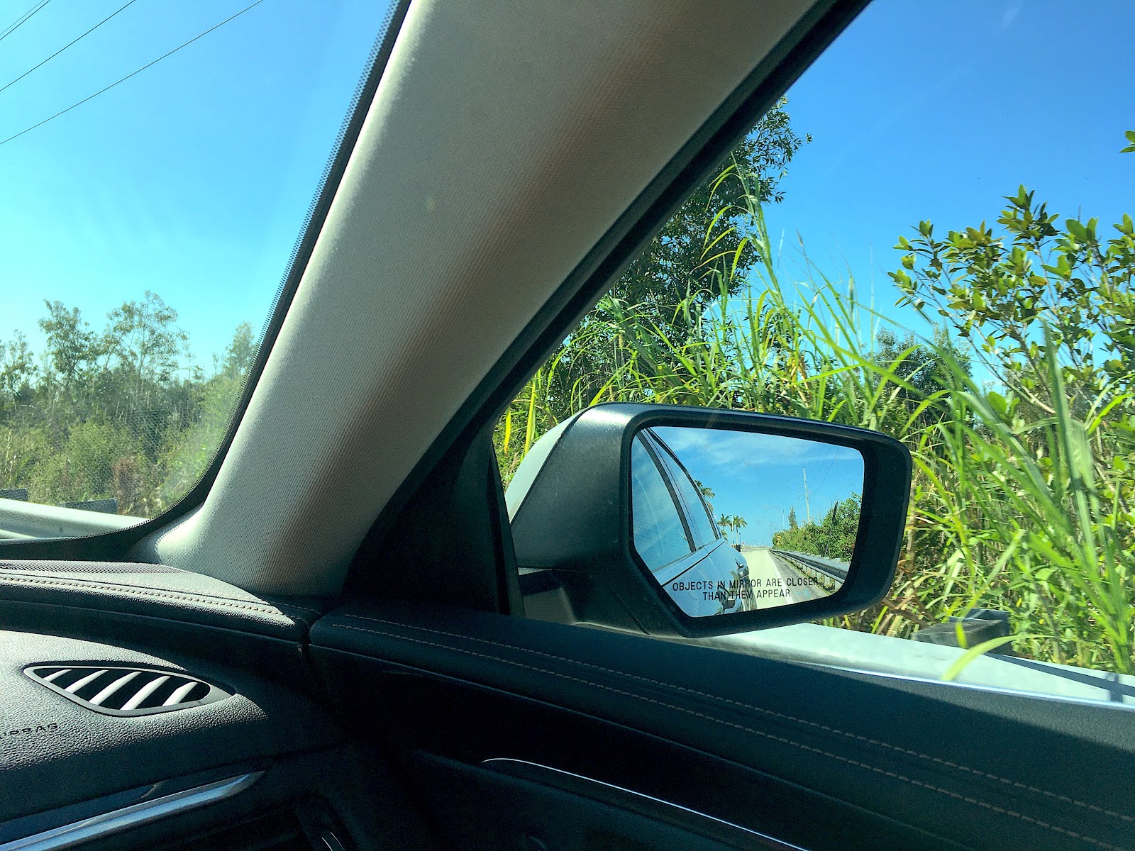 The passenger seat provides a view of Everglades National Park from the Tamiami Trail, less than ten minutes west of the UDB.